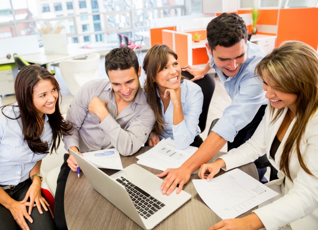 Business team at the office working on a laptop