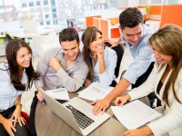 Business team at the office working on a laptop