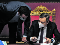 Italian Prime Minister Mario Draghi (R), speaks with leader of Lega, Matteo Salvini, during the debate on Recovery Plan at the Senate in Rome, Italy, 27 April 2021. MAURIZIO BRAMBATTI/ANSA